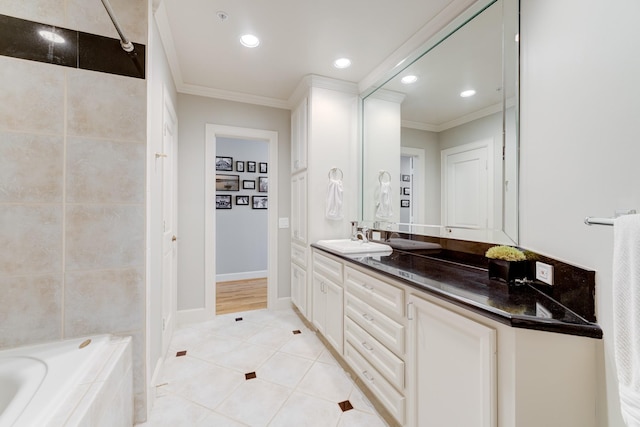 bathroom featuring tile patterned floors, crown molding, and vanity