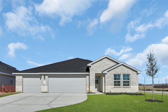 ranch-style home featuring a front yard and a garage