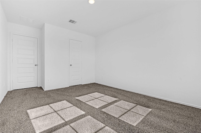 empty room featuring carpet floors