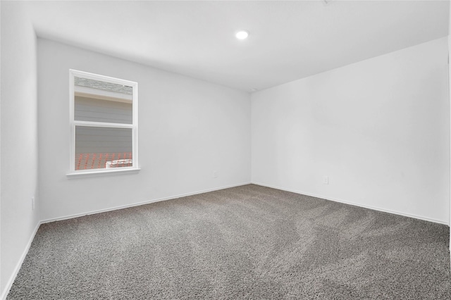 spare room with carpet flooring