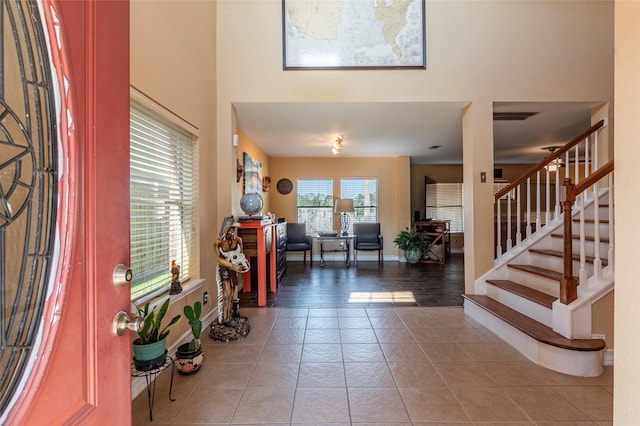 foyer featuring tile patterned floors