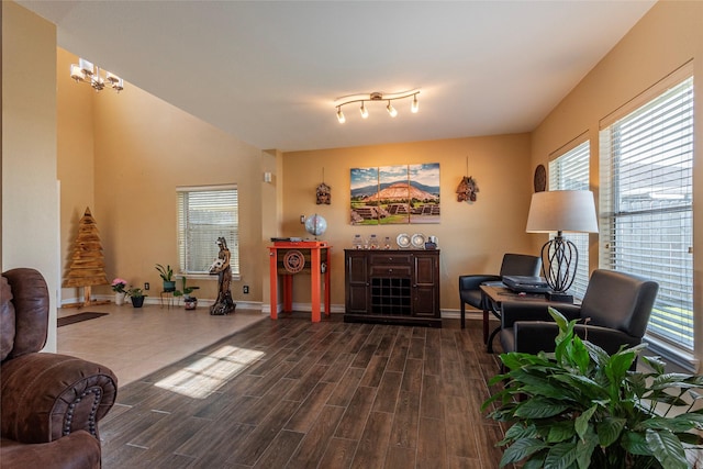 living area with an inviting chandelier