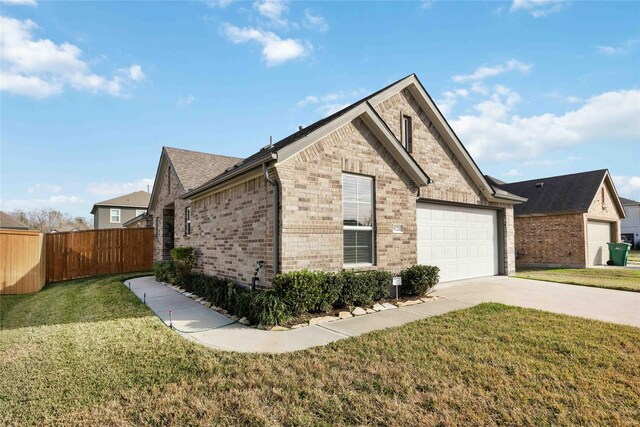 view of property exterior with a garage and a yard