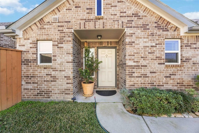 9211 Melmack Dr, Rosharon, TX 77583 - doorway to property with brick siding