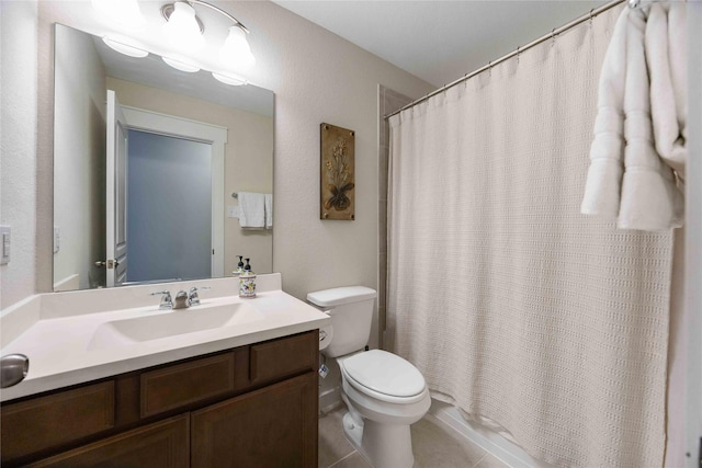 full bath featuring tile patterned flooring, a shower with curtain, toilet, and vanity