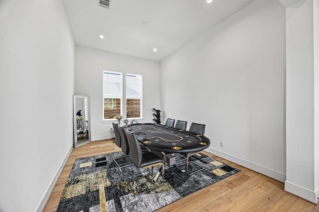 dining room with hardwood / wood-style flooring