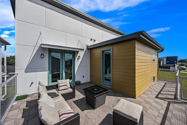 view of patio / terrace featuring outdoor lounge area and french doors