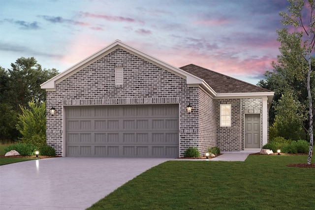 view of front of house featuring a garage and a lawn