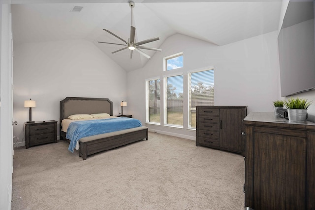 carpeted bedroom featuring ceiling fan and lofted ceiling