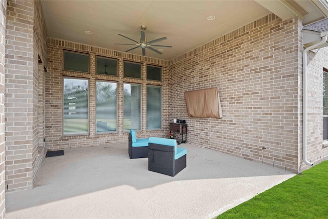 view of patio / terrace featuring ceiling fan