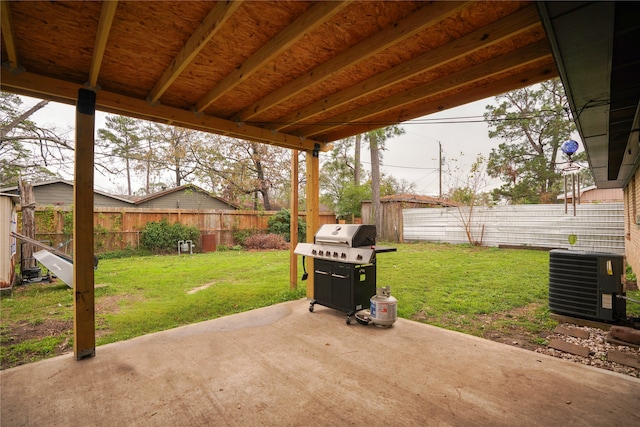 view of patio / terrace with central air condition unit and area for grilling