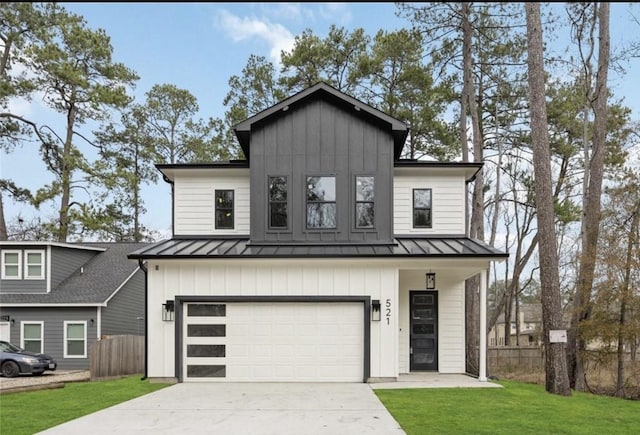 modern farmhouse with a front lawn and a garage