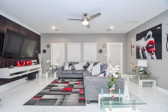 living room featuring ceiling fan