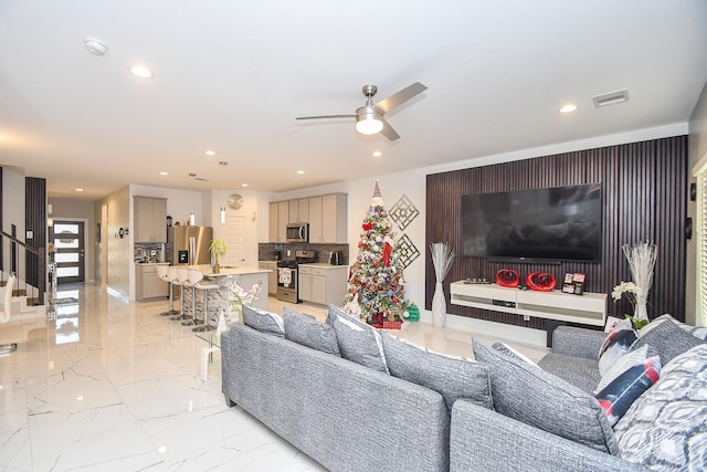 living room featuring ceiling fan