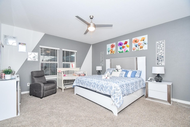 carpeted bedroom with ceiling fan