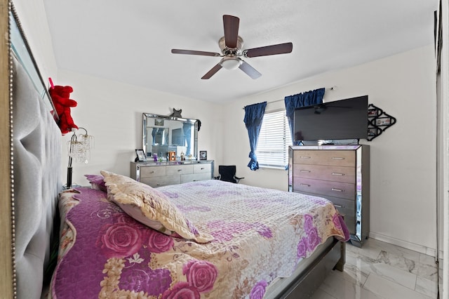 bedroom featuring ceiling fan