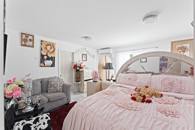 bedroom featuring a wall unit AC