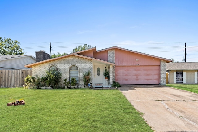 ranch-style home with a garage and a front yard