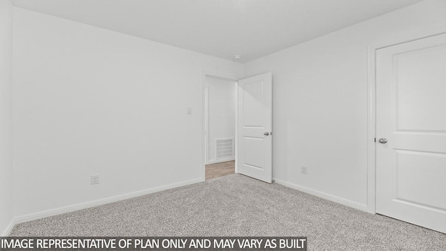 unfurnished bedroom featuring light colored carpet