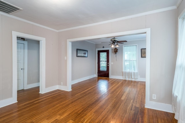 entrance foyer featuring ceiling fan, dark hardwood / wood-style flooring, and ornamental molding