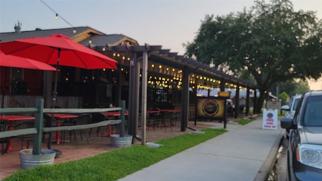 surrounding community with a pergola