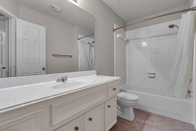 full bathroom with shower / bath combo, vanity, toilet, and tile patterned floors