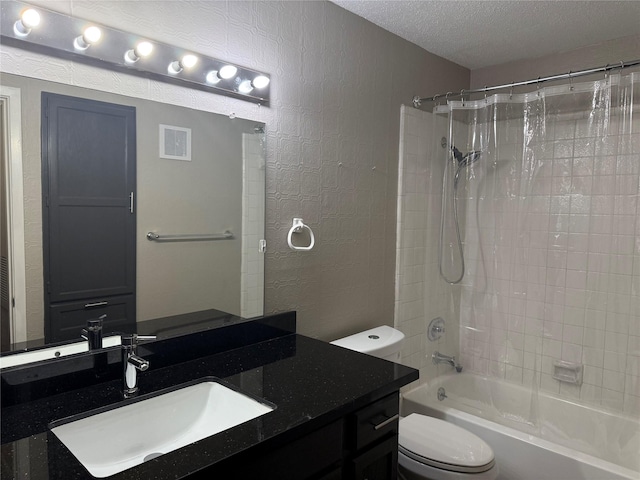 full bathroom with shower / bath combo, toilet, a textured ceiling, and vanity