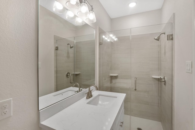 bathroom featuring vanity and walk in shower