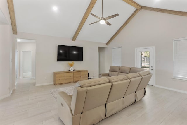 living room with beamed ceiling, high vaulted ceiling, and ceiling fan