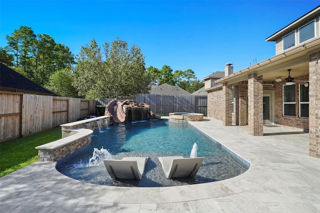 view of swimming pool featuring pool water feature, ceiling fan, an in ground hot tub, and a patio