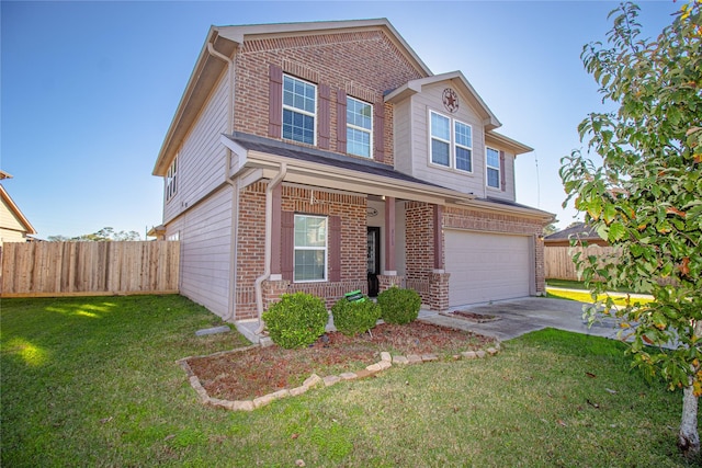 view of front of home with a front lawn and a garage