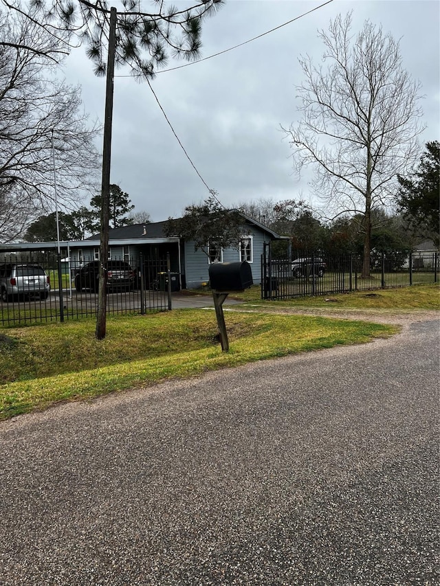 view of front facade with a fenced front yard