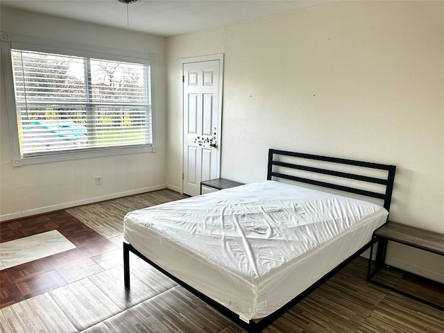 bedroom with baseboards