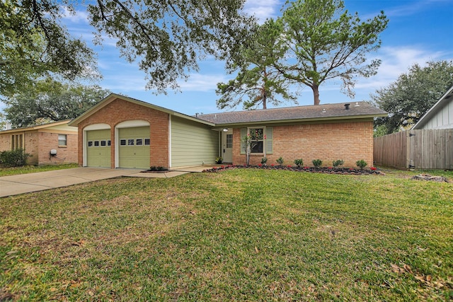 ranch-style house featuring a garage and a front lawn