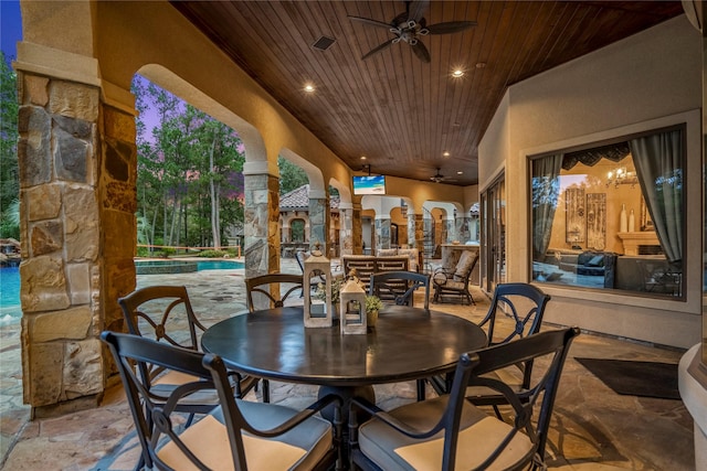 28322 Meadow Frst, Magnolia, TX 77355 - view of patio / terrace with ceiling fan, an outdoor pool, and outdoor dining area