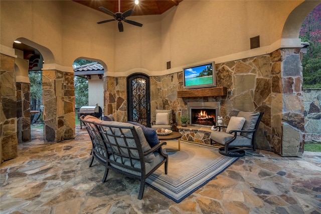 28322 Meadow Frst, Magnolia, TX 77355 - view of patio featuring an outdoor stone fireplace and ceiling fan