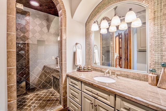 28322 Meadow Frst, Magnolia, TX 77355 - bathroom featuring vanity, a stall shower, and tasteful backsplash