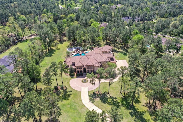 28322 Meadow Frst, Magnolia, TX 77355 - view from above of property with a heavily wooded area