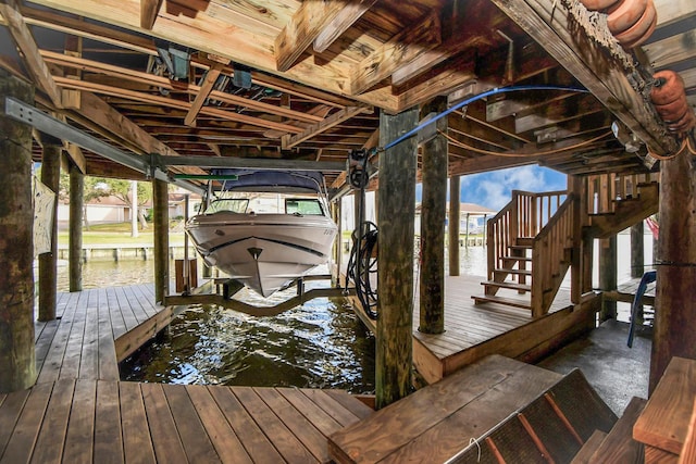 view of dock with a water view