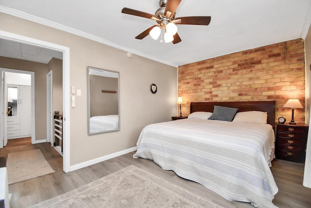 bedroom featuring hardwood / wood-style flooring and ceiling fan