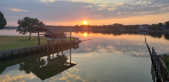 dock area featuring a water view