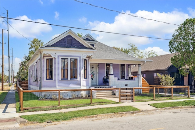 view of front of property featuring covered porch