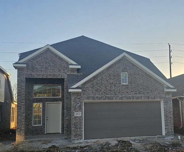 view of front of house with a garage