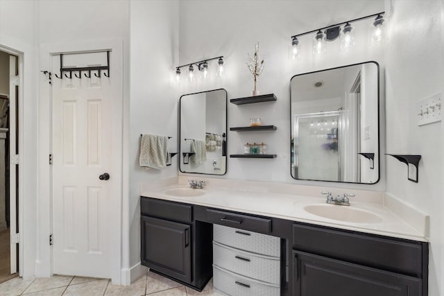 bathroom featuring vanity, tile patterned floors, and a shower with shower door