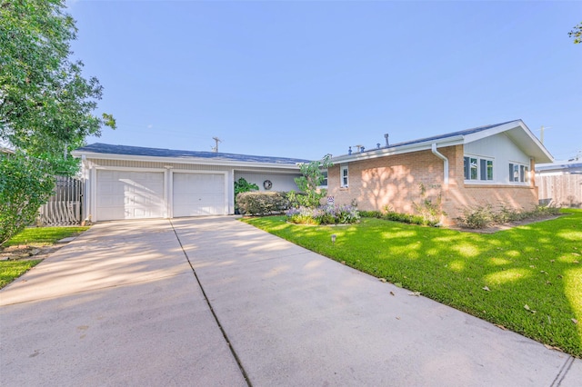 single story home with a front yard and a garage