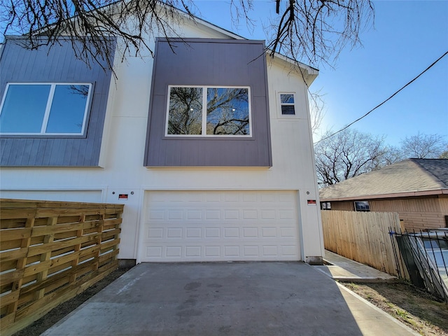 view of side of home featuring a garage