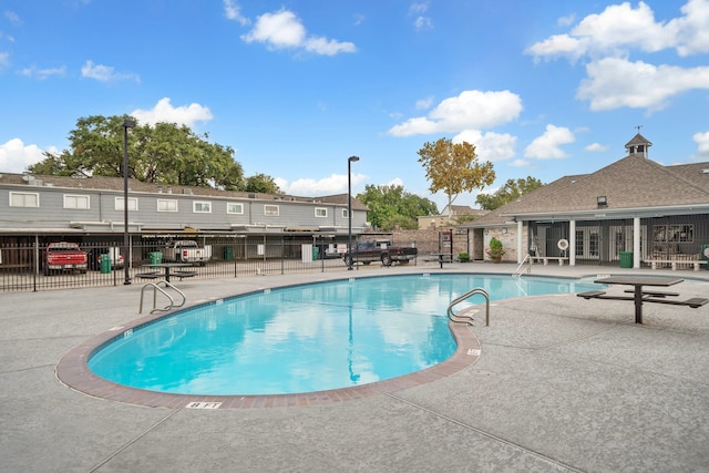 view of pool featuring a patio