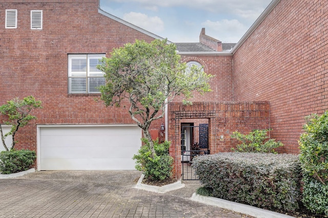 view of front of property featuring a garage