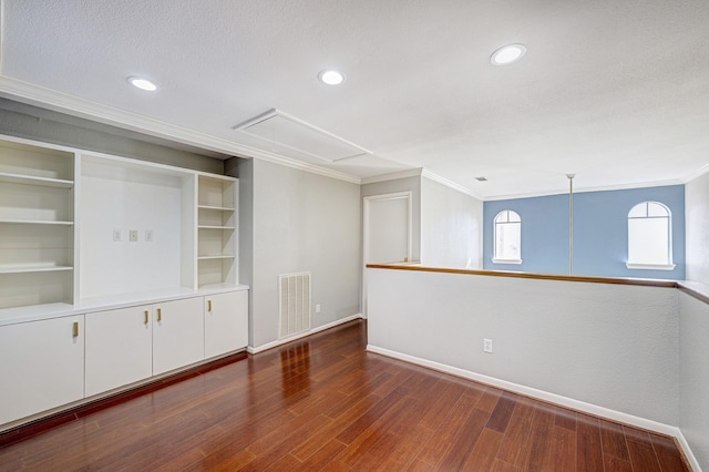 4 Rutgers Pl W, University Place, TX 77005 - unfurnished room featuring attic access, baseboards, ornamental molding, wood finished floors, and recessed lighting
