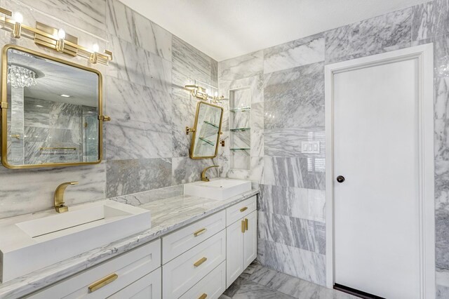 4 Rutgers Pl W, University Place, TX 77005 - full bath with tile walls, marble finish flooring, and double vanity